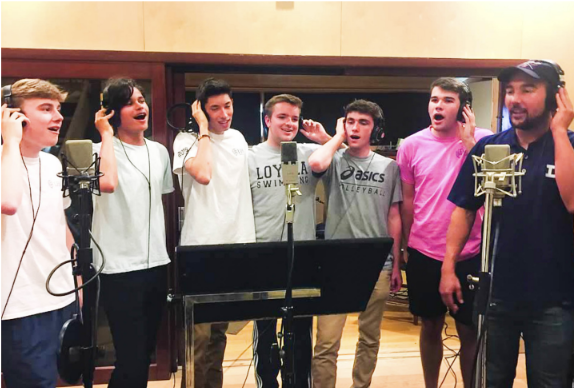 GRADUATED CUBS SING the beginning of "I am Loyola"